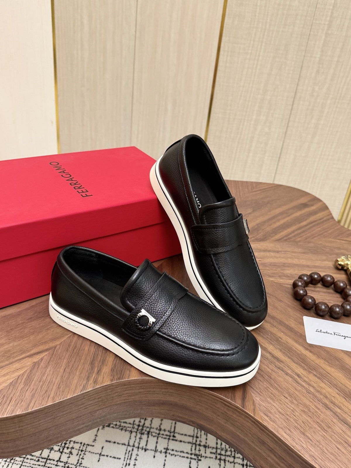 Salvatore Ferragamo Black Loafers with White Soles