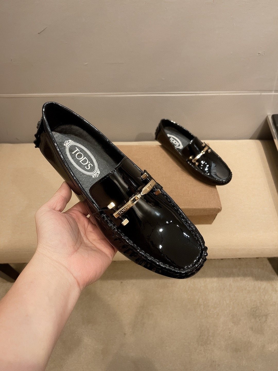 Tod's Glossy Metal Bar Loafers