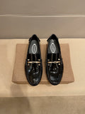 Tod's Glossy Metal Bar Loafers