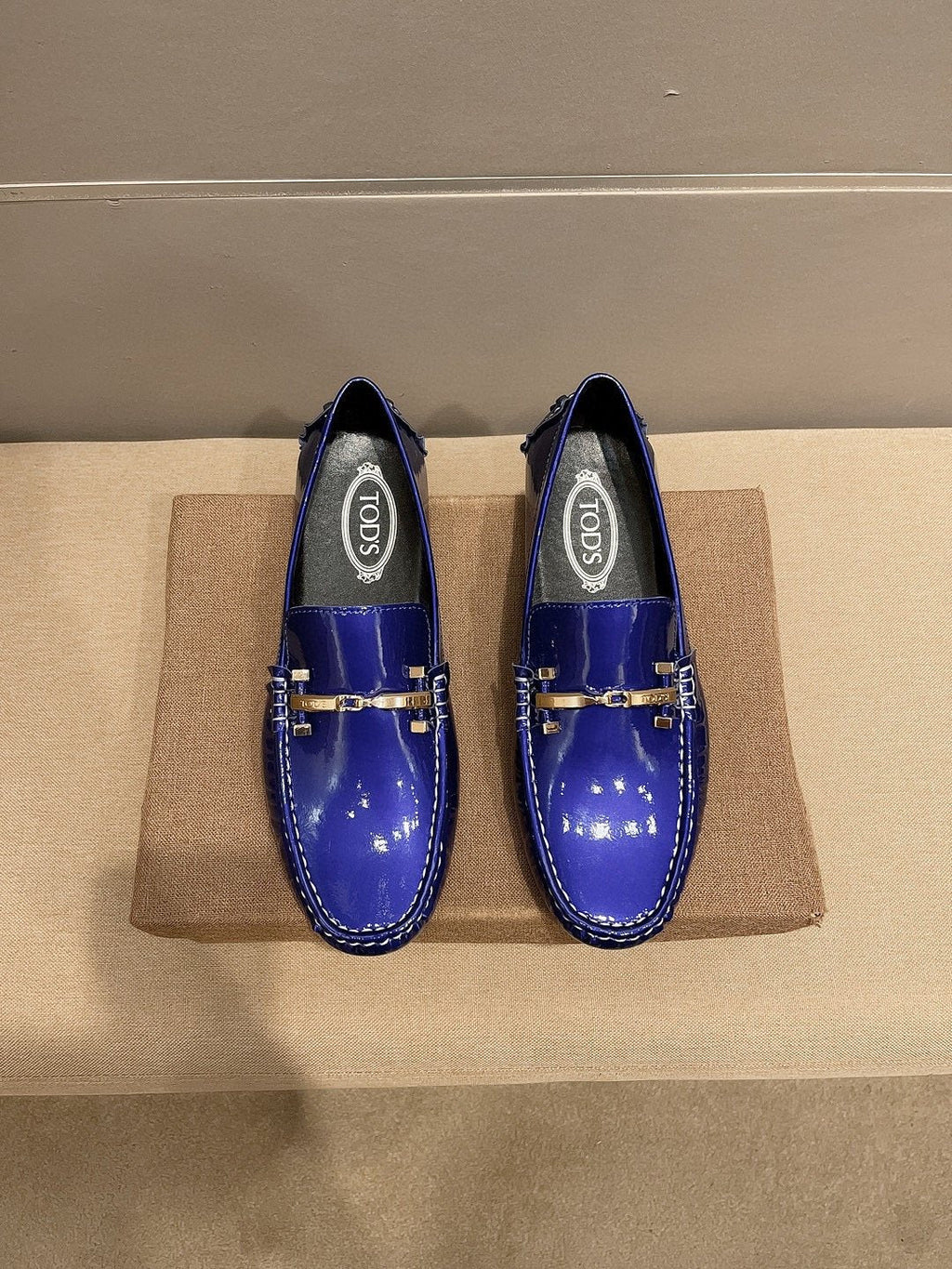 Tod's Glossy Metal Bar Loafers